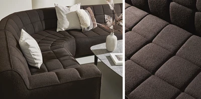 Brun afrundet sofa med tern
